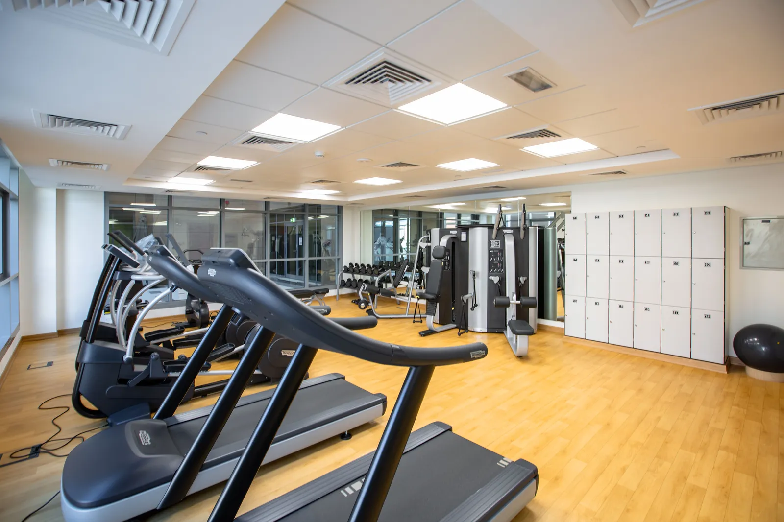 A clean gym floor with equipment